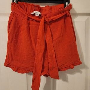 Hyfve size medium shorts with a belt.